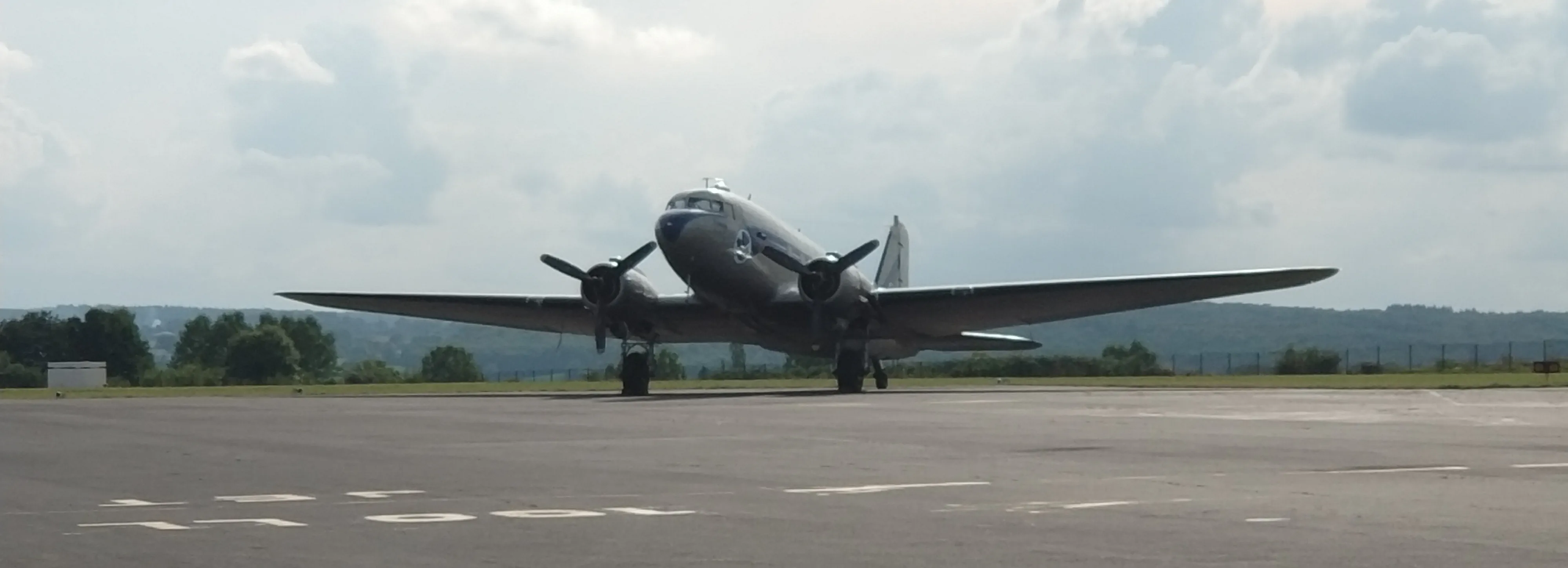 The DC3, freshly washed by the morning's storm, at Aurillac.